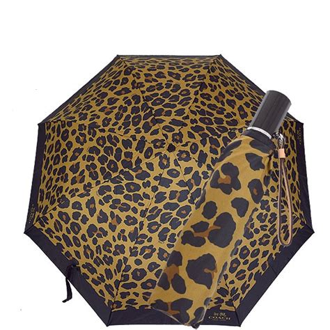 coach leopard print umbrella.